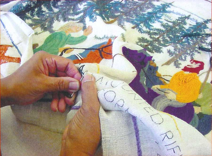 Stitching hands on the Fort Vancouver Tapestry